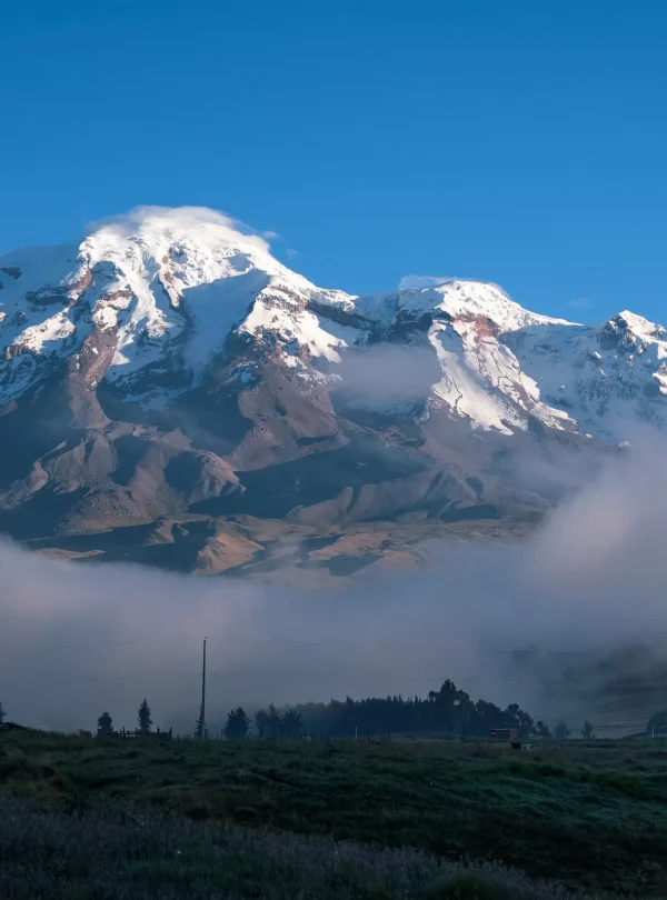Snow-capped Chimborazo Volcano rising above the Andean highlands in Ecuador.