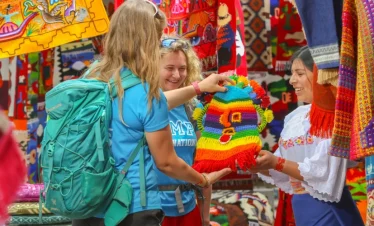 Panoramic view of Cuicocha Lake surrounded by mountains on a private tour