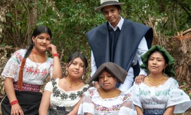 Local artisan weaving by hand during a private tour in Otavalo